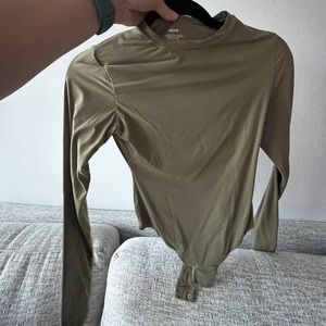 Skims medium body suit green